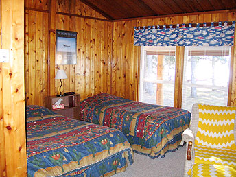 Motel room with double beds.