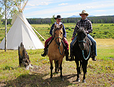 Getting ready to go out for a horse back ride.